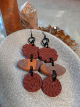 Load image into Gallery viewer, Rust flower dangle handmade earrings polymer clay earthy