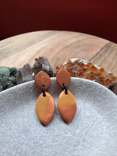 Load image into Gallery viewer, Orange fizz stud handmade earrings polymer clay earthy
